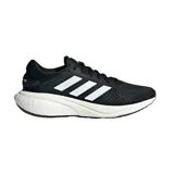 Championes de running Adidas Supernova 2, color negro con detalles en blanco. Presentan un diseño técnico con malla transpirable, entresuela con tecnología de amortiguación y las icónicas tres bandas laterales en contraste.