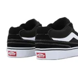 Championes Vans Caldrone Suede color negro con la icónica franja lateral blanca y suela de goma blanca.