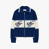 Campera de punto con cierre frontal, cuello polo y diseño de franjas horizontales en color azul, crema y celeste. Presenta el logo de la marca bordado en el frente.