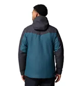 Campera 3 en 1 Columbia con sistema Interchange, compuesta por una capa exterior impermeable y transpirable con tecnología Omni-Tech y una capa interior aislante con forro termorreflectante Omni-Heat. Presenta diseño bicolor en azul y gris oscuro, capucha ajustable, ventilación en axilas, faldón para nieve y múltiples bolsillos con cierre.