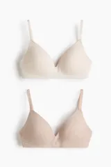 Pack de dos soutiens suaves de punto de algodón con copas con relleno, breteles ajustables y diseño sin aros. Incluye un modelo color beige liso y un modelo color tostado melange.
