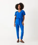 Pantalón jogger azul eléctrico de viscosa con cintura elástica ancha y lazo ajustable.