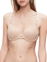 Sostén color piel con cobertura completa, copas moldeadas sin costuras, aro de soporte y tirantes ajustables.