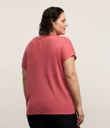Blusa tipo muscle tee de corte holgado, confeccionada en tejido rib acanalado, con escote redondo y diseño sin mangas.