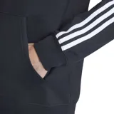 Buzo con capucha Adidas Originals, color negro, con el logo del trébol bordado en blanco en el pecho y las tres franjas blancas características a lo largo de las mangas. Posee bolsillo canguro frontal y cordones ajustables en la capucha.