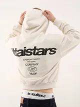 Canguro blanco con capucha, con gran estampado en la espalda en color negro que incluye texto y logotipos de la marca.