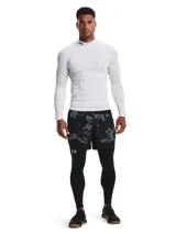 Remera térmica Under Armour CG Armour Comp Mo, color blanco, de manga larga y cuello alto con el logo de la marca impreso en el cuello. Diseñada con ajuste de compresión para entrenamiento.