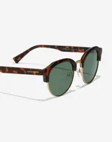Lentes de sol Hawkers unisex, modelo Classic Rounded, con montura carey y lentes verdes polarizadas.
