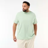 Camiseta de manga corta con cuello redondo, confeccionada en algodón de color verde menta.