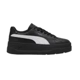 Championes de plataforma Puma Karmen Classic, color negro con la clásica franja lateral en blanco y suela chunky negra.