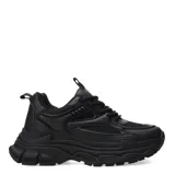 Championes urbanos de estilo chunky, completamente blancos, con diseño de paneles superpuestos en malla y material sintético, cordones al tono y suela de plataforma dentada.