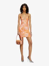 Vestido mini de tirantes finos color naranja con estampado difuminado en blanco.