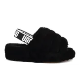 Sandalias tipo pantufla UGG modelo Fluff Yeah, confeccionadas en piel de oveja negra, con plataforma y correa elástica trasera con el logo de la marca.