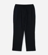 Pantalón de pijama de corte holgado, confeccionado en franela de algodón. Presenta cintura elástica con cordón de ajuste y diseño de rayas verticales.