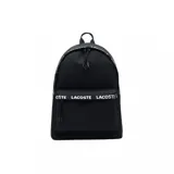 Mochila Lacoste de diseño urbano en color negro, confeccionada en material sintético resistente. Presenta un compartimento principal con cierre y un bolsillo frontal con cierre, ambos decorados con una cinta distintiva que lleva el nombre de la marca estampado en blanco. Incluye tiradores de cierre ergonómicos y asa superior.
