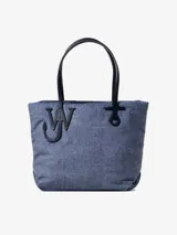 Bolso tote azul denim con asas de cuero sintético negro y logo de ancla.