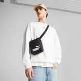 Bandolera Puma color negro con logo de la marca estampado en blanco en el frente. Cuenta con correa ajustable y cierre superior.