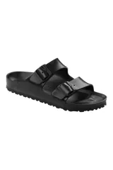 Sandalias Birkenstock Arizona, hechas de goma EVA color negro, con dos correas ajustables con hebillas. Diseño anatómico y ultraligero.