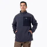 Buzo polar de media cremallera Merrell, confeccionado en microfleece de poliéster reciclado. Presenta cuello alto, bolsillo frontal con cierre y refuerzos en nylon ripstop en la zona superior del pecho. Cuenta con puños y basta elásticos para un ajuste térmico óptimo.