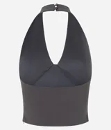 Blusa corta de bengalina negra con frente único, breteles anchos, recorte en el busto y cierre con botones en el cuello.