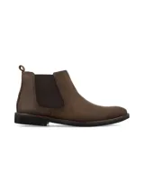Bota tipo Chelsea de cuero marrón, con paneles laterales elásticos, tirador en la parte trasera y suela de goma negra.
