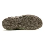 Zapatillas tipo slip-on Merrell modelo Jungle Moc, confeccionadas en gamuza color beige con detalles en verde claro y suela de goma marrón. Presentan diseño sin cordones con paneles elásticos laterales para facilitar el calce y tecnología Air Cushion en el talón para mayor amortiguación.