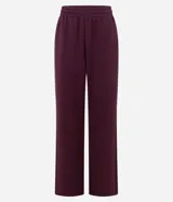 Pantalón de corte recto con cintura elástica y lazo de ajuste frontal. Confeccionado en tejido modal con caída fluida y estructura cómoda.