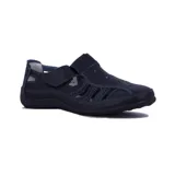 Guillerminas casuales de cuero sintético negro, con suela baja y ajuste con velcro.