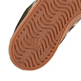 Championes urbanos Adidas modelo VL Court 3.0, color marrón oscuro con suela de goma color caramelo. Presentan las icónicas tres tiras laterales con estampado animal print y logo de la marca en la lengüeta y lateral.