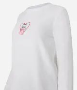 Conjunto de pijama largo confeccionado en fleece, compuesto por una blusa de manga larga con bordado de gatito comiendo pizza y un pantalón con cintura elástica y estampado de lunares.