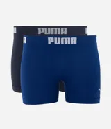 Kit de dos calzoncillos tipo boxer sin costuras de la marca Puma, confeccionados en poliamida, con cintura elástica con lettering y pequeño logo en la pierna. Incluye una unidad en azul y otra en negro.