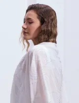 Pashmina de gasa color blanco con apliques de brillos.