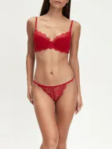 Colaless de encaje color rojo con elástico fino en la cintura.