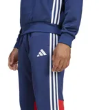 Pantalón deportivo Adidas de corte ajustado, color azul con detalles en blanco y rojo. Presenta cintura elástica con cordón ajustable, puños acanalados en los tobillos y el logo de la marca estampado en la pierna.
