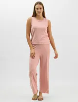 Pantalón tejido de corte recto y diseño fluido, color amarillo, con cintura ancha elastizada.