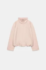 Chaqueta bomber de Zara Woman Collection color rosado, con cuello subido, cierre frontal con cremallera, mangas largas y bajo abullonado con elástico.