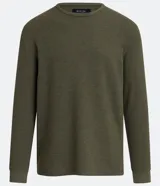 Remera verde militar de manga larga, cuello redondo y corte recto.