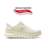 Championes deportivos Skechers Slip-Ins Go Walk Arch Fit, modelo Ria en color beige con tecnología de soporte en el arco y diseño sin cordones con elásticos.