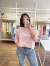 Buzo rosa de algodón y elastano, de corte holgado y mangas 3/4.