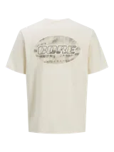 Remera color crema de algodón con cuello redondo y manga corta. Estampa ovalada con la palabra CORE en el centro.