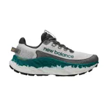 Championes New Balance MTMORL Fresh Foam X Trail More para hombre, ideales para running. Diseño en tonos gris, blanco y verde.
