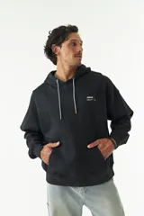 Canguro color crema con capucha ajustable, lettering estampado en el frente, logo en grifa de goma y puños.