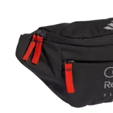 Riñonera deportiva Adidas del equipo Audi Revolut F1 Team, de color negro con detalles en rojo y logotipos estampados. Cuenta con compartimentos con cierre y correa ajustable.