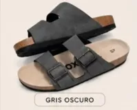 Sandalias de dos tiras con hebillas ajustables, plantilla anatómica y suela de corcho sintético, color gris oscuro.