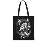 Tote bag de tela color negro con estampa frontal de cabeza de lobo en estilo tatuaje tradicional, con detalles en blanco y sombreado de puntos.