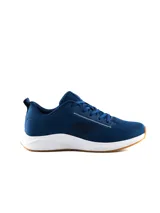 Championes deportivos Umbro modelo Volten para hombre, color azul con suela blanca y base de goma marrón.