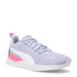 Championes deportivos Puma Anzarun Lite, confeccionados en malla textil azul marino con detalles en rosa y verde agua. Presentan el logo de la marca en el lateral y en la puntera, con suela blanca de espuma EVA.
