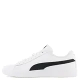 Championes Puma Smash V2 de cuero sintético color negro con detalles en blanco, cordones negros y suela blanca.