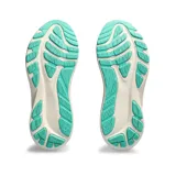 Championes de running Asics GT-2000 12 para mujer, color azul marino con entresuela blanca, detalles en dorado y suela verde turquesa. Confeccionados en tejido de malla transpirable, incorporan tecnología FF Blast+ y PureGel para mayor amortiguación.