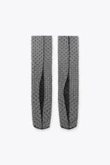 Calcetines altos de mujer, semitransparentes, color negro, confeccionados en tul con diseño de lunares pequeños (plumeti).